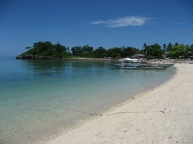 1.beach.on.the.western.side.of.Guimbitayan.with.fishermens.bancas.jpg