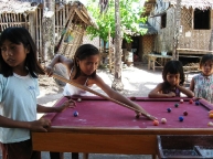 Guimbitayan.kids.playing.pool.in.front.sari-sari.jpg