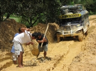 digging the jeepney out of the mud