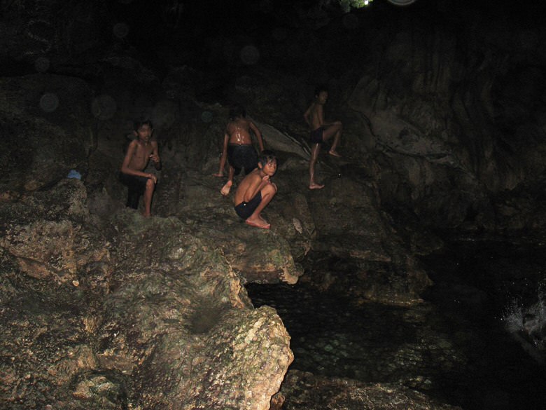 local kids seem to love diving into the 9 foot deep waters of the cave