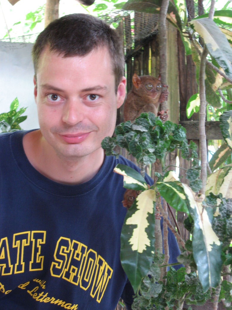 Me with two of my new gremlin looking friends named Tarsiers